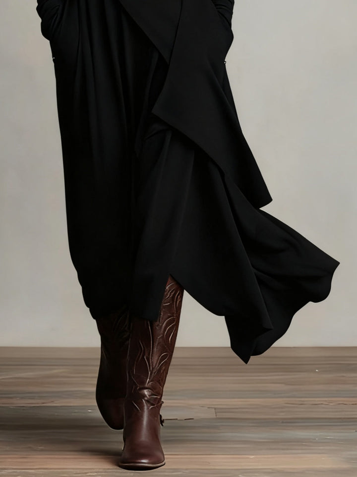 Vivienne Maxikleid in Schwarz – Detailansicht des asymmetrisch drapierten Saums